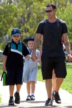 ‘‘Nice guys don’t always come last.’’ Daniel Geale collects his children Bailey, Lilyarna and Ariyelle from school on Thursday.