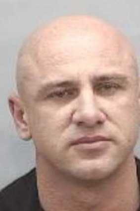 Michael Basanovic, 47, who is wanted on a charge of murdering Zeljko "Steve" Mitrovic.