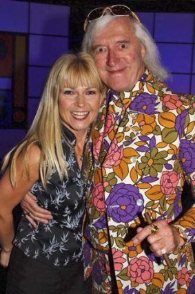 Toyah Wilcox and Jimmy Saville  on the television show <i>Top of the Pops</i> at BBC TV studios in London.