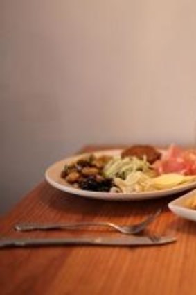 Small antipasto, stuffed sardines and calamari with parsley salt at Rosa's Kitchen.