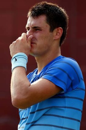 Getting down to serious business: Bernard Tomic.