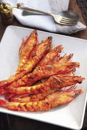 Barbecue prawns with honey, soy and ginger.