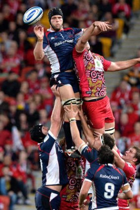 Jarrod Saffy of the Rebels gets above James Horwill in the lineout at Suncorp Stadium.