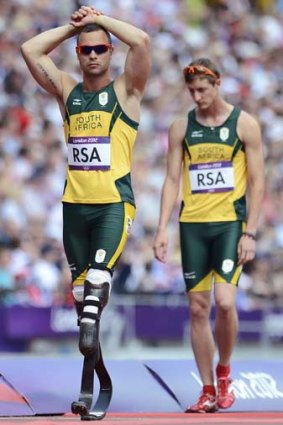 He's back ... Oscar Pistorius (left) will get another chance to run at the Olympic Games.