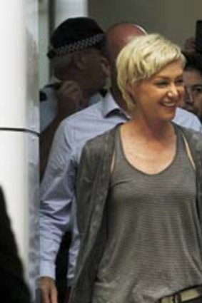 Arrival: Ellen DeGeneres and Portia de Rossi at Sydney Airport on Friday.