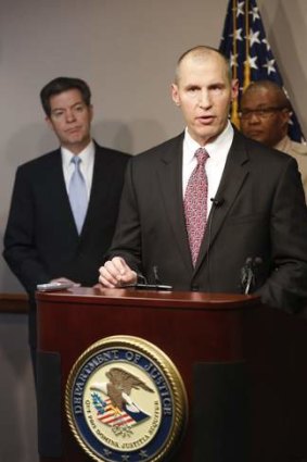 Special Agent in Charge Michael Kaste of the FBI office announces charges against a man in Wichita, Kansas.