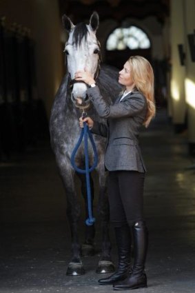 The neighs have it: Champion showjumper Edwina Tops-Alexander with one of her stable. 