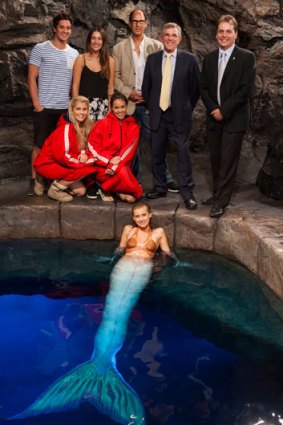 <i>Mako: Island of Secrets</i> cast members Isabel Durant (front), Amy Ruffle and Allie Bertram (kneeling), Chai Romruen and Gemma Forsyth, with producer Jonathan Shiff, Arts Minister Ian Walker and Member for Albert Mark Boothman.