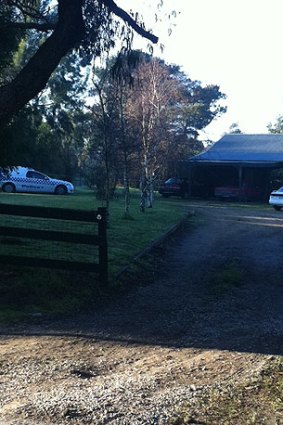 Police cars outside the Cannons Creek home.