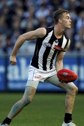 Midfielder John McCarthy playing for Collingwood against Melbourne in round 12 last year.