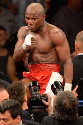 Floyd Mayweather   celebrates after defeating Miguel Cotto  during their WBA super welterweight title fight in May.