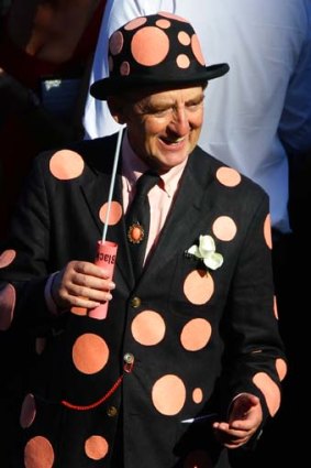 Imitation is the best form of flattery: A punter sports the colours of Black Caviar.