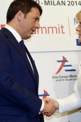 Australian Foreign Minister Julie Bishop (right) is welcomed by Italian Prime Minister Matteo Renzi.