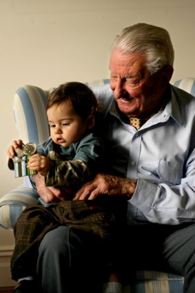 Des Ward, the oldest Legacy person, with the youngest Legacy child, 12-month-old Isaac Zariffa.