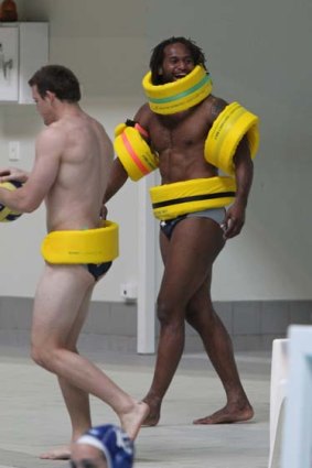 Buoyant ... Lote Tuqiri clowns around during the Kangaroos' recovery session at Sydney Olympic Park pool yesterday.