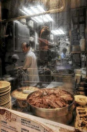 Moments in time: A street vendor in Hong Kong.