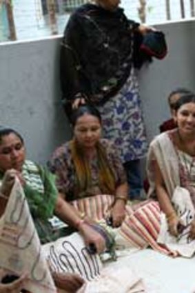 Surrogate mothers at the Akanksha clinic with their embroidery.