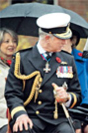 Prince Charles chats to his wife, Camilla, Duchess of Cornwall, during a military ceremony in British Columbia this week.