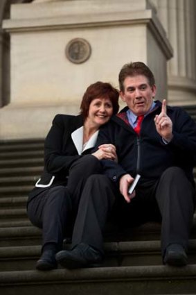 Damian and Rae Panlock on the steps of parliament after the passing of "Brodie's Law".