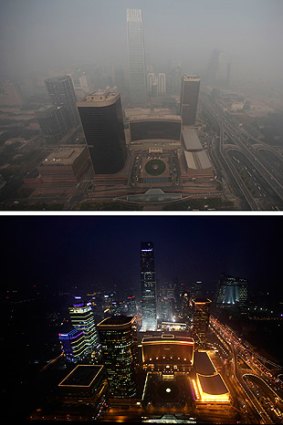 Spot the difference ...  The city skyline from the Beijing Yintai Centre building amid heavy haze and smog, in the morning on October 29, 2011 (top) and by night on October 28.