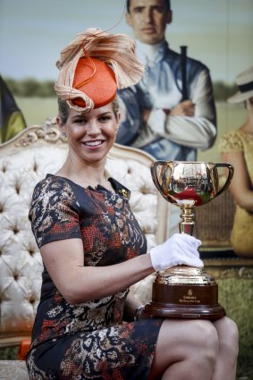 Alison Saville with the Melbourne Cup trophy.