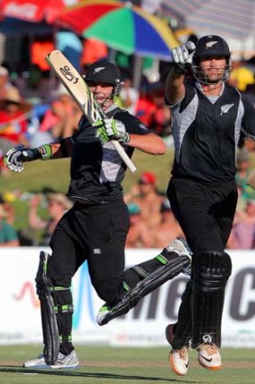 Mitchell McClenaghan and James Franklin celebrate after the latter hit the winning runs in the first one-day international against South Africa ion Saturday.
