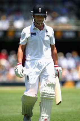 Dejected: A disappointed Jonathan Trott walks from the field after being dismissed by Mitchell Johnson.