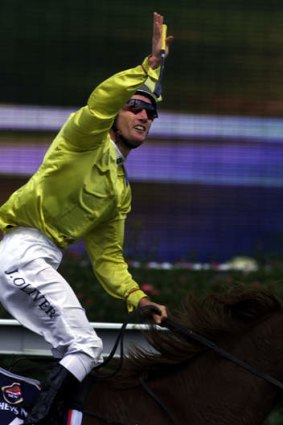 True legacy: the image of Damien Oliver saluting the heavens after winning the 2002 Melbourne Cup on Media Puzzle will linger long after memories of his 10-month ban evaporate.