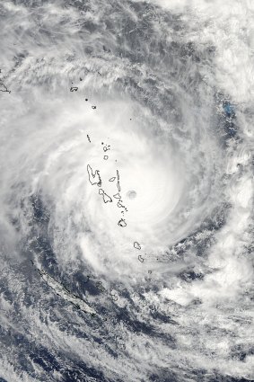 Fewer, more intense cyclones forecast: The eye of Cyclone Pam moving over Vanuatu.