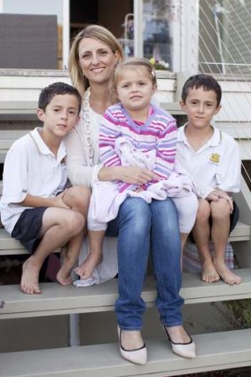 Making it happen: mums@work founder Emma Walsh at home with her children, Ewan, Alice and Luc.