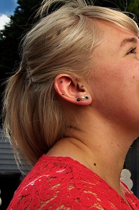 Piercings create questions in the workplace.