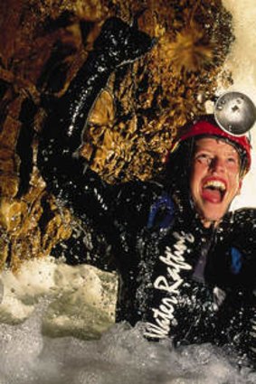 Black water rafting inside the Waitomo Caves, New Zealand.