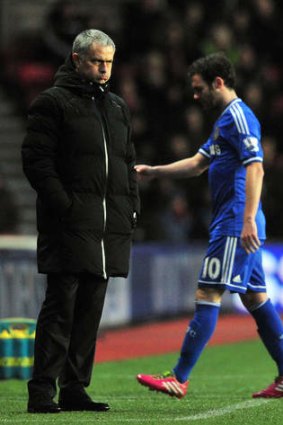 Frosty relationship: Chelsea's Portuguese manager Jose Mourinho and Juan Mata.