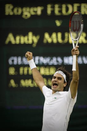 Winner... Roger Federer celebrates.