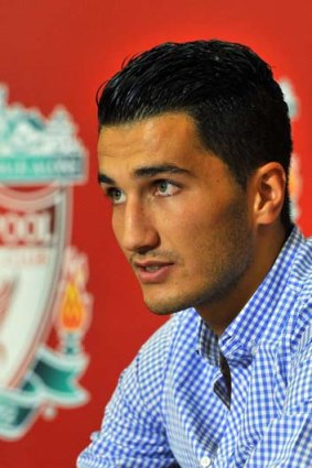 Liverpool's new signing, Nuri Sahin, speaks to the media at the club's training ground on Tuesday.