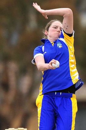 ACT Meteors bowler Rene Farrell bowls against Tasmania during a Women's National Cricket League match at Chisholm Oval.