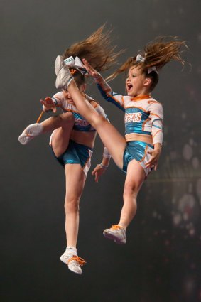 Sky high ... children competing at the cheerleading championships.