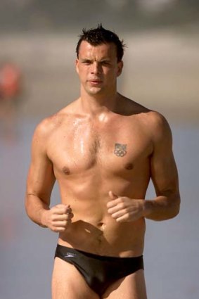 Scott Miller jogging along a Gold Coast beach in 2002.