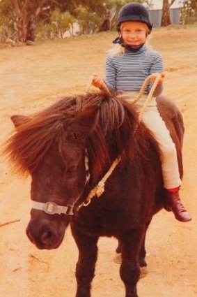 Megan Jones with her first pony, Ebony.