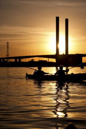 The sun sets over Melbourne's waterways.