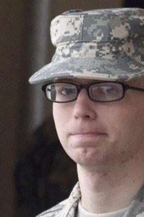 Army Pfc. Bradley Manning is escorted by military police from the courthouse.