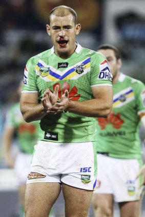 Bloody comeback: Canberra five-eighth Terry Campese  cheers on his team against the Warriors at Canberra Stadium on Saturday night.