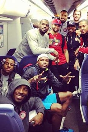 Members of the US basketball team ride the public transport system.