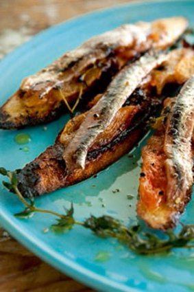 Anchovies and tomato confit on toast.