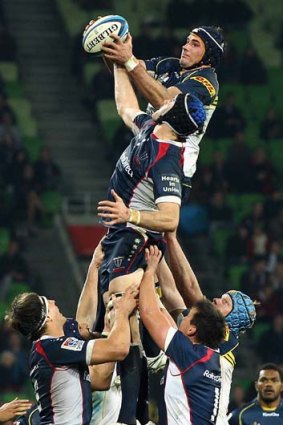 On top of the world &#8230; Ben Mowen seizes the lineout ball in Friday night's match.
