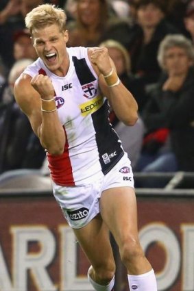 Plucky: Nick Riewoldt celebrates a goal in the win over Essendon.