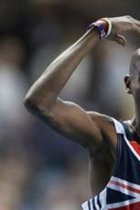 Mo Farah celebrating the world title with the now-famous 'Mobot' pose.
