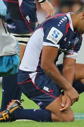 Floored &#8230; Rebels star Kurtley Beale after hurting his shoulder in the loss to the Brumbies.