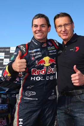 Craig Lowndes poses with Mark Skaife after breaking his record.
