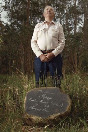 Bush burial … John Gough beside the Lismore bushland grave of his mother-in-law, Evelyn Greene.